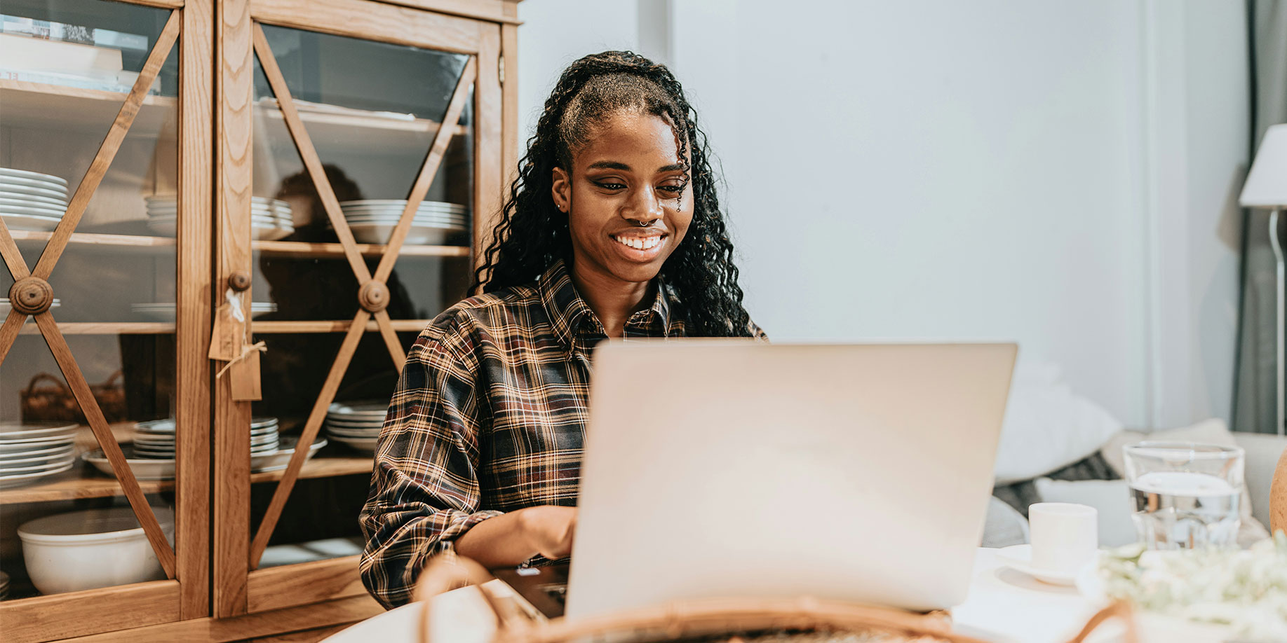 Smiling woman at her computer