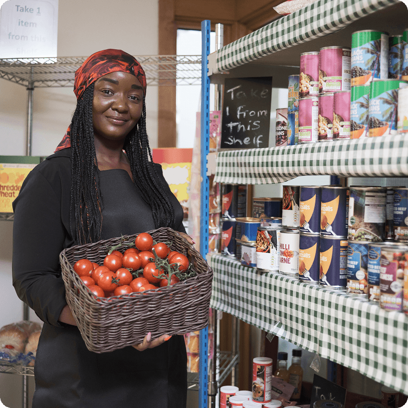 A volunteer at a food bank