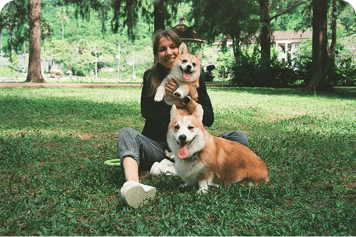 A dog owner with her dogs
