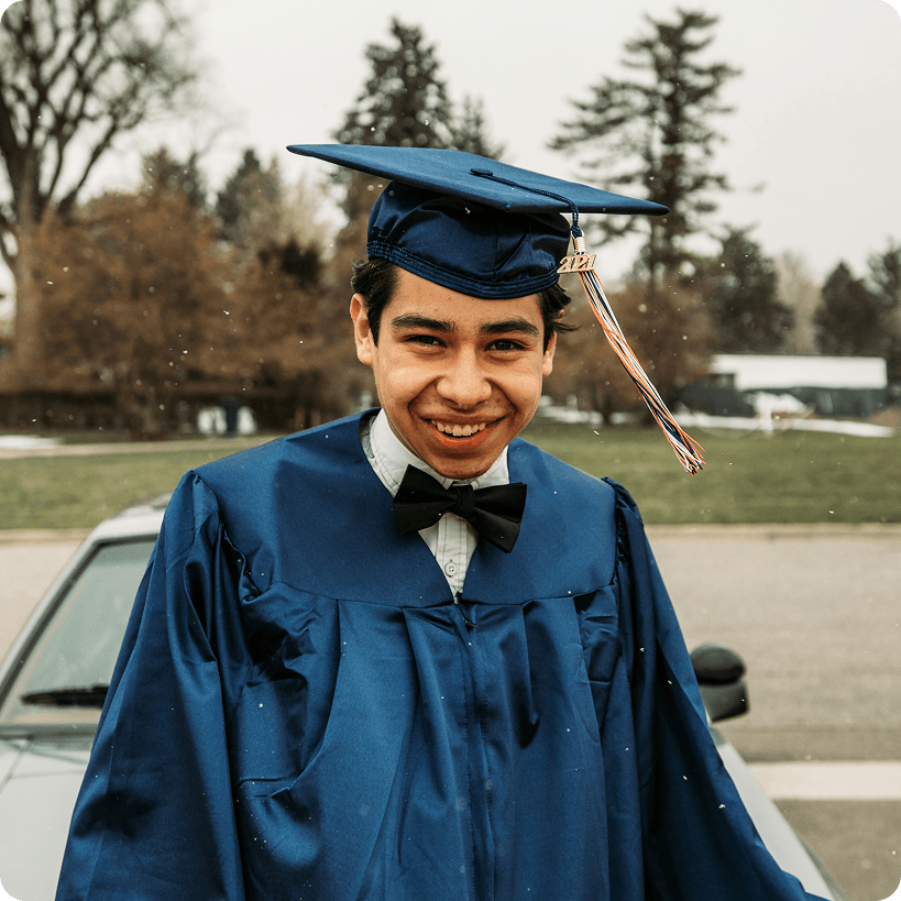 A graduate in their robe