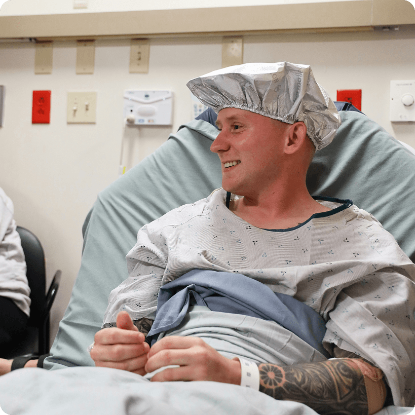 Smiling patient prepped for surgery
