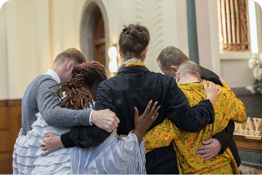 A group hug at a memorial
