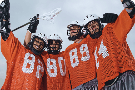A lacrosse team celebrating